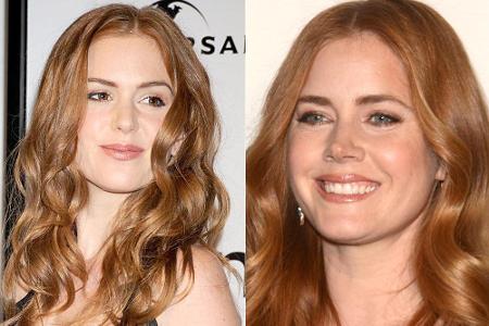 Die rote Lockenmähne ist ihr Markenzeichen: Isla Fisher (li.) und Amy Adams werden auf dem roten Teppich gerne mal verwechselt.