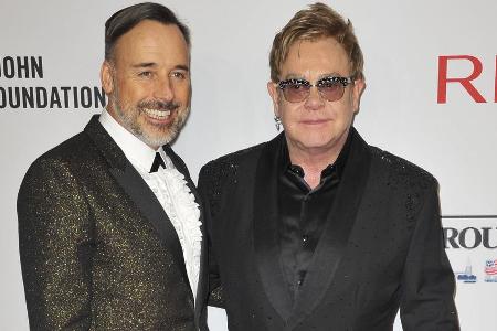 Elton John und sein Ehemann David Furnish sind Gastgeber einer der berühmtesten Oscar-Afterparys