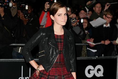 2011 wird optisch ihr verrücktestes Jahr: Zu den GQ Awards in London trägt sie ein kurzes rot-kariertes Petticoat-Kleid mit ...