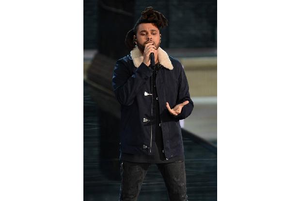 ...Shooting-Star The Weeknd, der der Fashion Show eine männliche Note verlieh. Ohne jeden Zweifel ein Traum für die meisten...