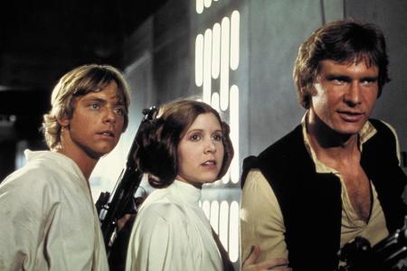 Luke Skywalker (Mark Hamill), Prinzessin Leia (Carrie Fisher) und Han Solo (Harrison Ford) sind die Haupt-Protagonisten der ...