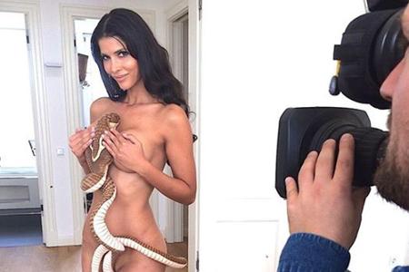 Eine Stoff-Schlange verdeckt ihre intimsten Körperteile