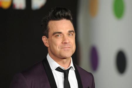 Dreimal will Pop-Star Robbie Williams (41) bereits Ufos gesehen haben. Das erste Mal als Kind, das zweite Mal in Beverly Hil... Dreimal will Pop-Star Robbie Williams (41) bereits Ufos gesehen haben. Das erste Mal als Kind, das zweite Mal in Beverly Hil...