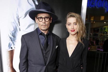 Auf dunkle Töne setzten Heard und Depp bei einer Filmpremiere in Los Angeles. Während die 29-Jährige ein tief ausgeschnitten...