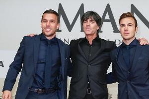 Lukas Podolski, Joachim Löw und Mario Götze bei der Filmpremiere von "Die Mannschaft"