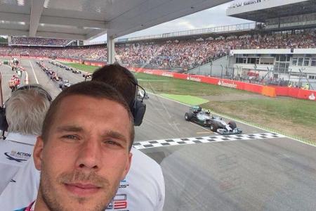 Lukas Podolski drückt Nico Rosberg beim Heim-Grand-Prix die Daumen