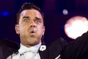 Bühnensturz: Robbie Williams bricht einem Fan den Arm
