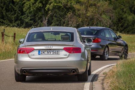 Audi A5 Sportback 3.0 TFSI, BMW 335i GT, Heckansicht