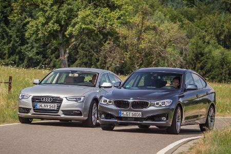 Audi A5 Sportback 3.0 TFSI, BMW 335i GT, Frontansicht