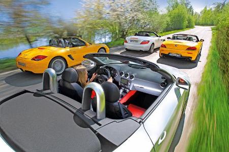 Audi TTS Roadster, BMW Z4 35i, Mercedes SLK 350, Porsche Boxter S Audi TTS Roadster, BMW Z4 35i, Mercedes SLK 350, Porsche Boxter S