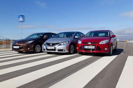 Ford Focus 2.0 TDCi, Honda Civic 2.2 i-DTEC, Mazda 3 2.2 MRZ-CD, Frontansicht Ford Focus 2.0 TDCi, Honda Civic 2.2 i-DTEC, Mazda 3 2.2 MRZ-CD, Frontansicht