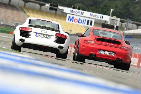 Als Carrera 4S fordert der neue Porsche 911 den Audi R8 nun mit dessen ureigenen Mitteln heraus. Als Carrera 4S fordert der neue Porsche 911 den Audi R8 nun mit dessen ureigenen Mitteln heraus.