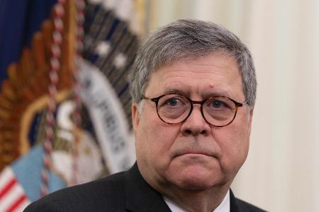 United States Attorney General William P. Barr listens as US...