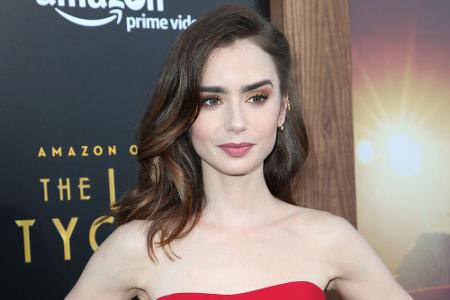 Auch Lily Collins (29) ist Teil der jungen Hollywood-Riege. Ihr Vater schrieb dagegen Musik-Geschichte.