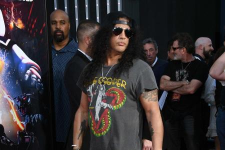 Der Guns'n'Roses-Gitarrist Slash ist selbsternannter Schlangenfan. In seinem Zuhause leben mit Tigerpythons und Boas sogar l...