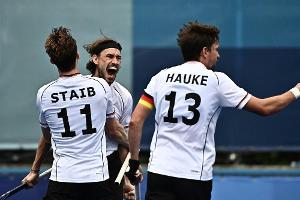Starke Hockey-Männer schlagen Großbritannien