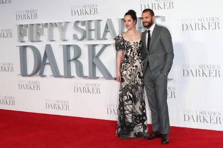 …Dakota Johnson und Jamie Dornan, die als Anastasia Steele und Christian Grey die 'Fifty Shades of Grey'-Saga aufheizen. Wäh...