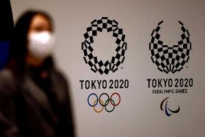 Zuschauer in Tokio: Entscheidung womöglich erst im Juni