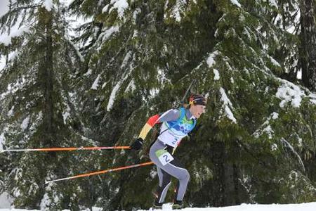 Auch in den Wäldern des Olympia-Parks in Whistler verlor Neuner nie den Durchblick. 2010 gewann sie Verfolger und Massenstar...