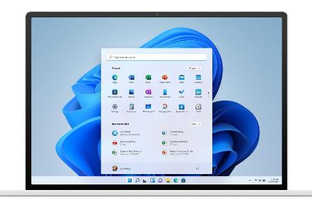 Das Startmenü in Windows 11 kommt ohne Kacheln und eine stets sichtbare Programmliste aus. Stattdessen setzt Microsoft auf e...