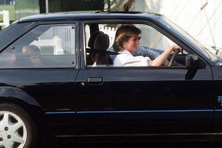 Princess Diana with Prince William on the backseat in her Ford Escort RS Turbo Mk3