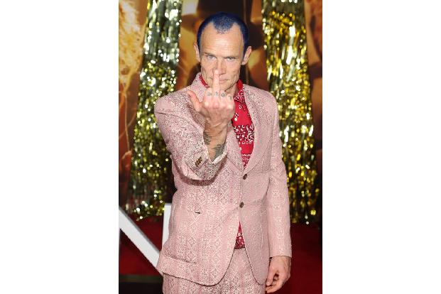 Den Vogel schoss Flea ab, der Bassist der Red Hot Chili Peppers. Er unterhielt die anwesenden Fotograf*innen nicht nur mit unanständigen Gesten sondern...