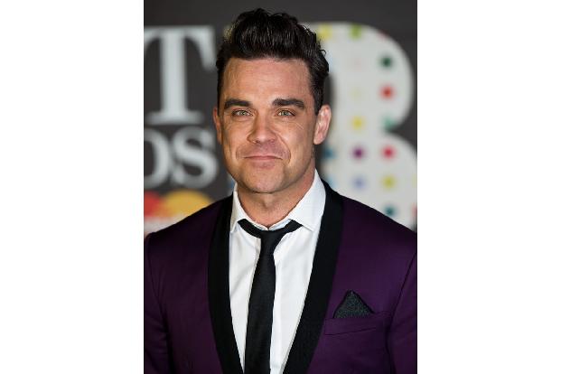 2003 war Robbie ein Weltstar, und so spielte er zum Beispiel drei ausverkaufte Open Airs in Knebworth, nördlich von London vor insgesamt mehr als 375.000 Fans. Lediglich in den USA wollte sich der Erf ...