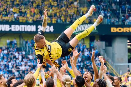 Höhenflug: Nach dem Bundesligaspiel von Borussia Dortmund gegen Darmstadt 98 wird Marco Reus in die Luft geworfen. Es war sein letztes Spiel für die Dortmunder.