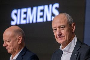 Siemens schreibt Rekordgewinn - und baut Jobs ab