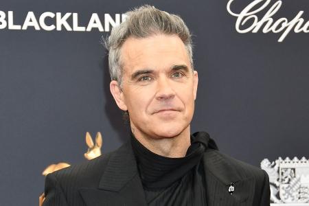 Robbie Williams mit rührender Geste an Familie von Liam Payne Robbie Williams mit rührender Geste an Familie von Liam Payne