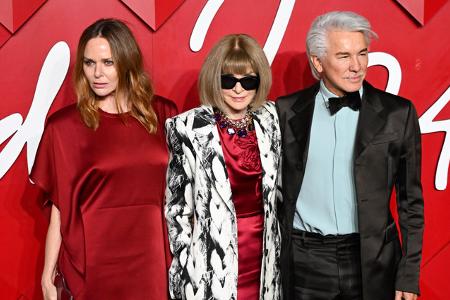Gruppenbild mit Fashion-Superstars: Designerin Stella McCartney, 'Vogue'-Chefredakteurin Anna Wintour und Regisseur Baz Luhrmann ('Moulin Rouge').