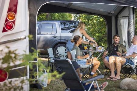 Family relaxing at camping site