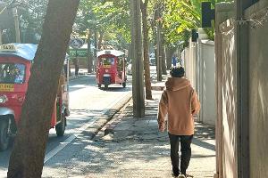 Thais in Pullover und Wolljacke: "Kältewelle" in Bangkok