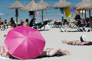 "Populärste Form des Glücks" - Neuer Urlaubsrekord
