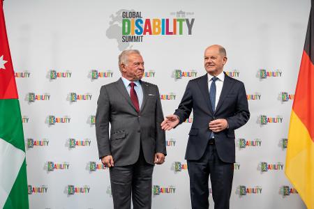 Der geschäftsführende Bundeskanzler Olaf Scholz (SPD) und der jordanischen König Abdullah II. forderten international verstärkte Anstrengungen für Inklusion und Teilhabe.