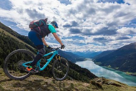 Lake Reschen scenic mountain bike downhill.