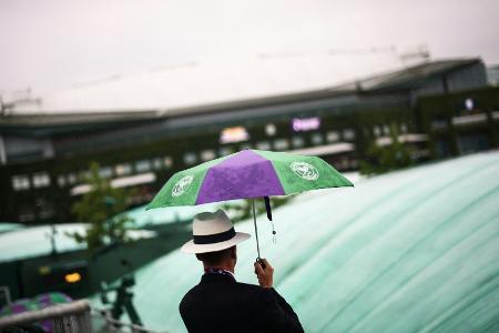 Regen verzögert Spielbeginn in Wimbledon Regen verzögert Spielbeginn in Wimbledon