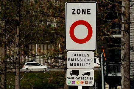 Low Emission Zone sign put up along the road. Traffic Low Emission Zone sign put up along the road. Traffic