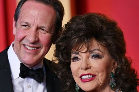 Joan Collins und Percy Gibson