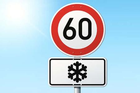 Tempolimit-Schild mit Schneeflocke Tempolimit-Schild mit Schneeflocke