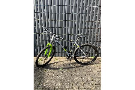 Mountainbike grau mit neongrüner Federgabel der Marke Zündap