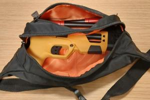 Gürteltasche mit Pfeilabschussgerät