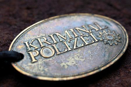 Symbolbild: Kriminaldienstmarke