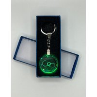 Stelby Schlüsselanhänger Unendlichkeitszeichen Schlüsselanhänger Q Multicolor mit Geschenkbox von Stelby